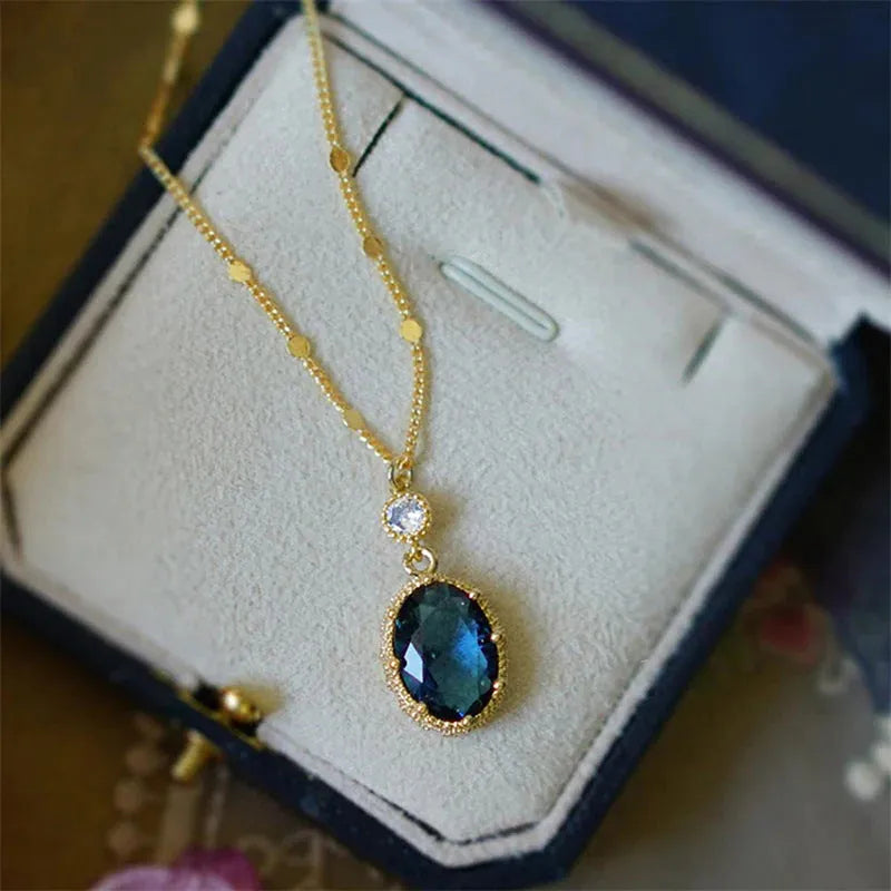 Geometric French retro necklace with electroplated gold colour finish on copper pendant
