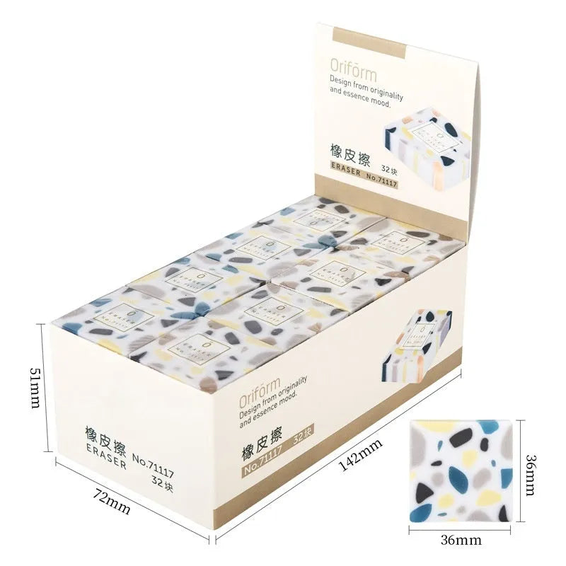 White brick-shaped rubber eraser for traceless pencil mark removal on paper