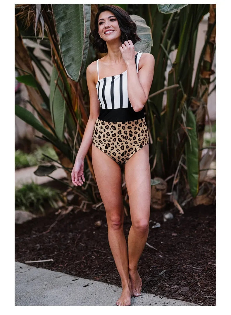 Women's leopard print one-piece swimsuit with asymmetric collar and high-waist briefs style.