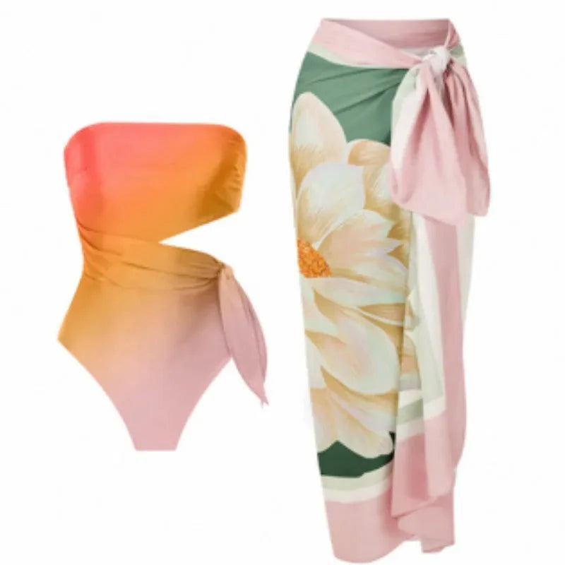 Women's retro printed one-piece swimsuit in a bikini style, shown on a mannequin.