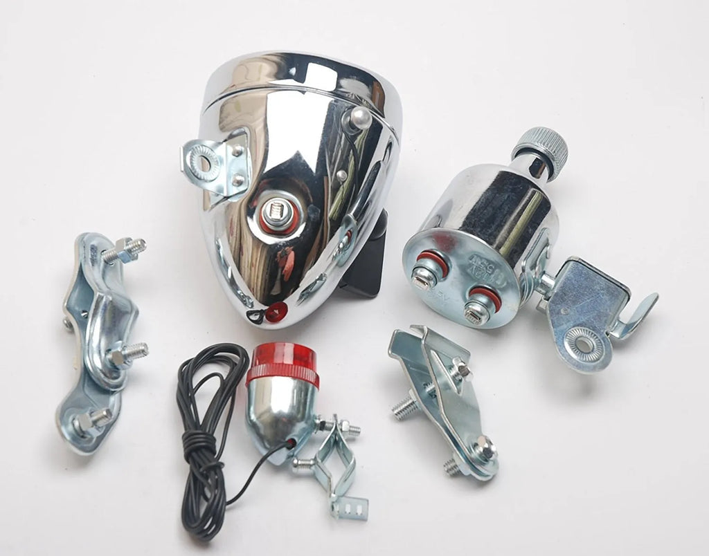 Silver bicycle dynamo light kit for front fork mounting with friction generator