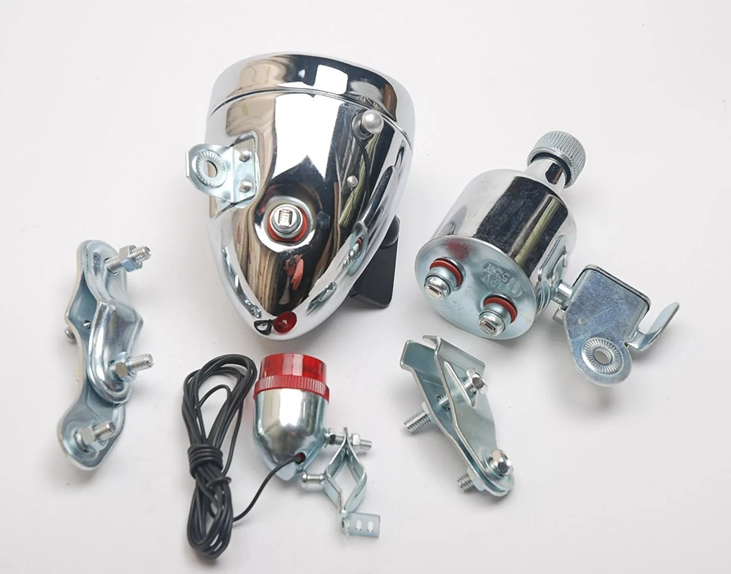 Silver bicycle dynamo light kit for front fork mounting with friction generator