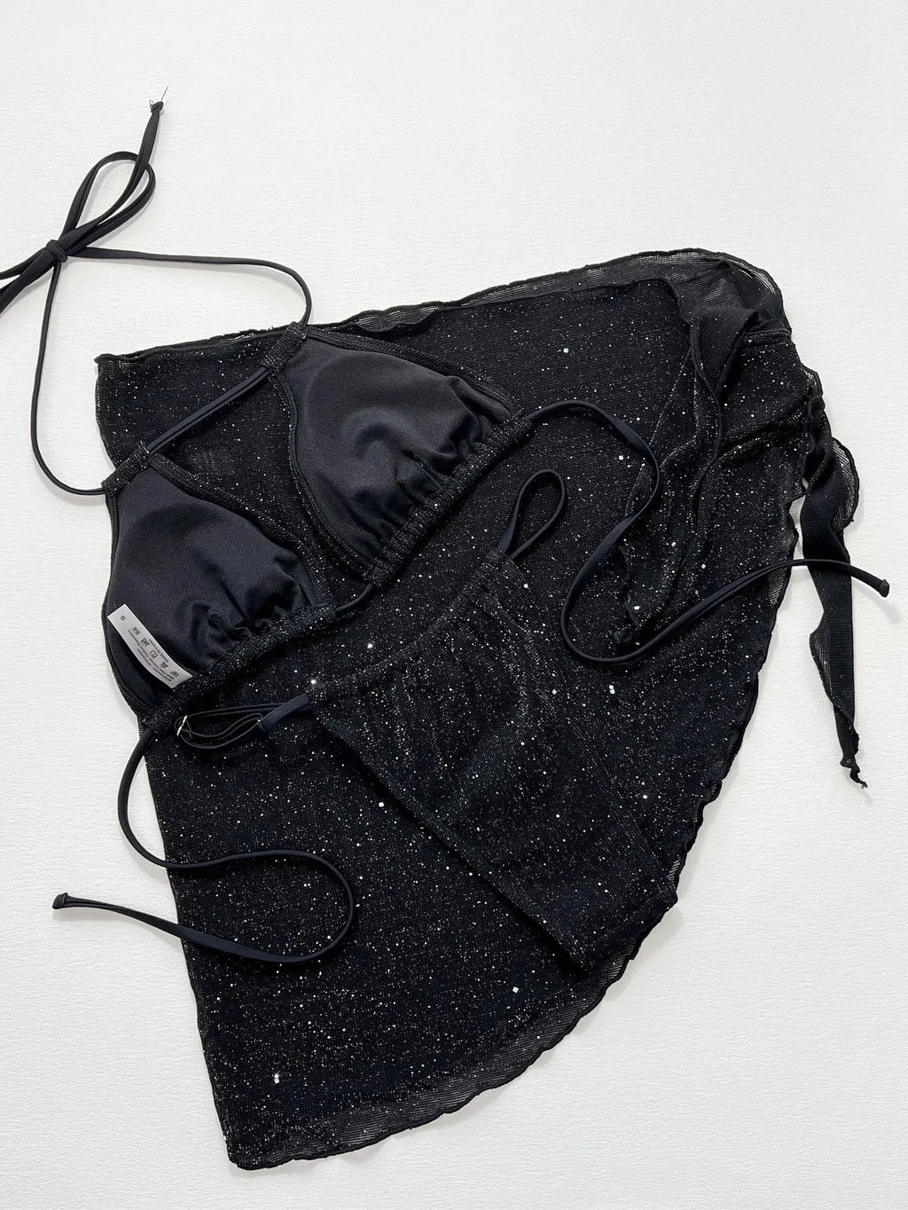 Black polyester three-piece bikini swimsuit set with separate top and shorts