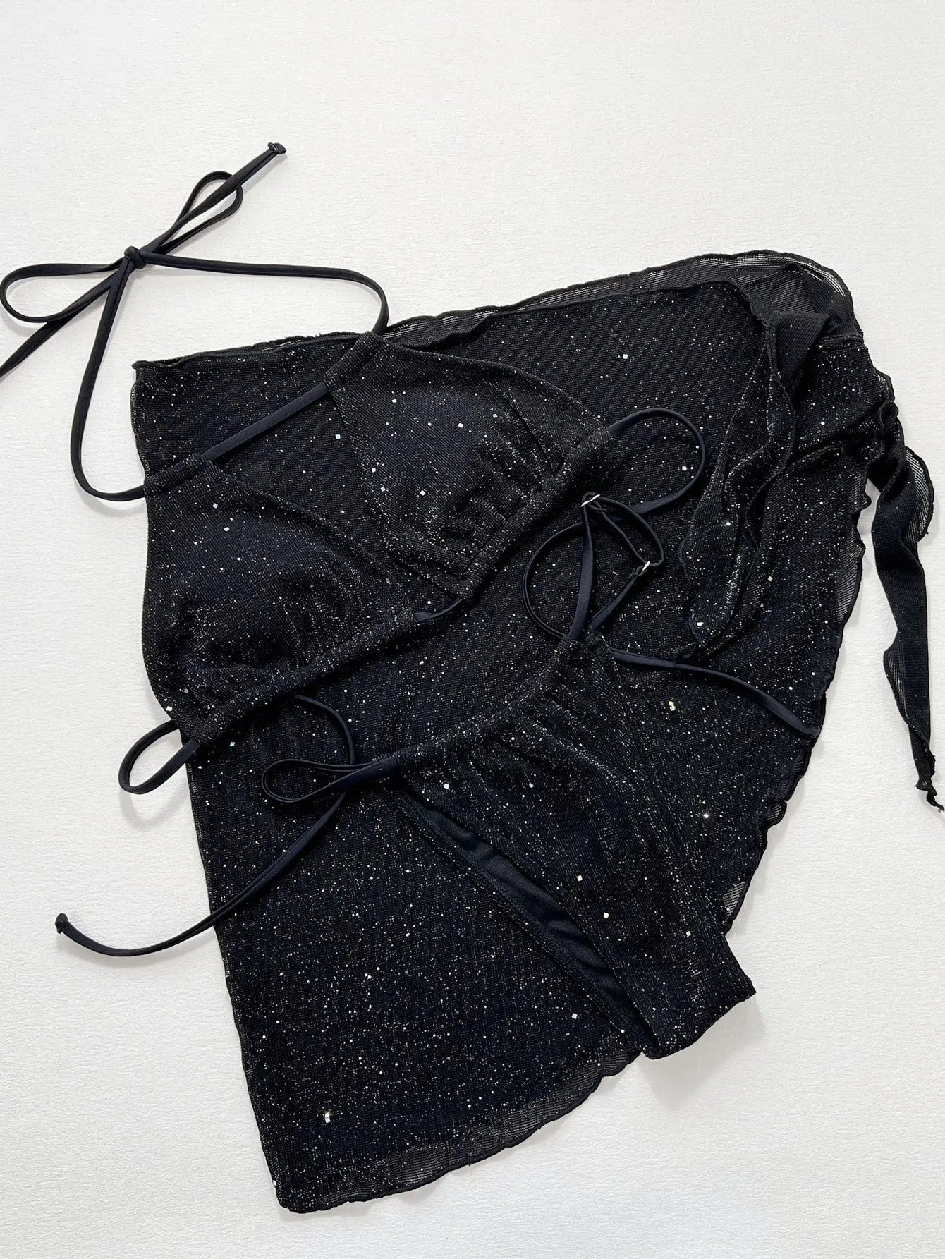 Black polyester three-piece bikini swimsuit set with separate top and shorts