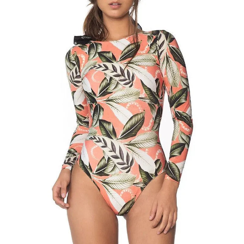 Women's leaf printed one-piece swimsuit with a low back, shown in available sizes.