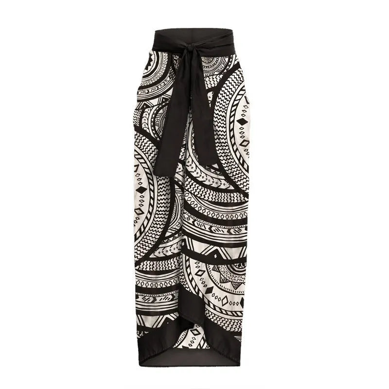 Women's vintage print one-piece swimsuit with deep V-neck and ruffled trim, includes matching wrap skirt