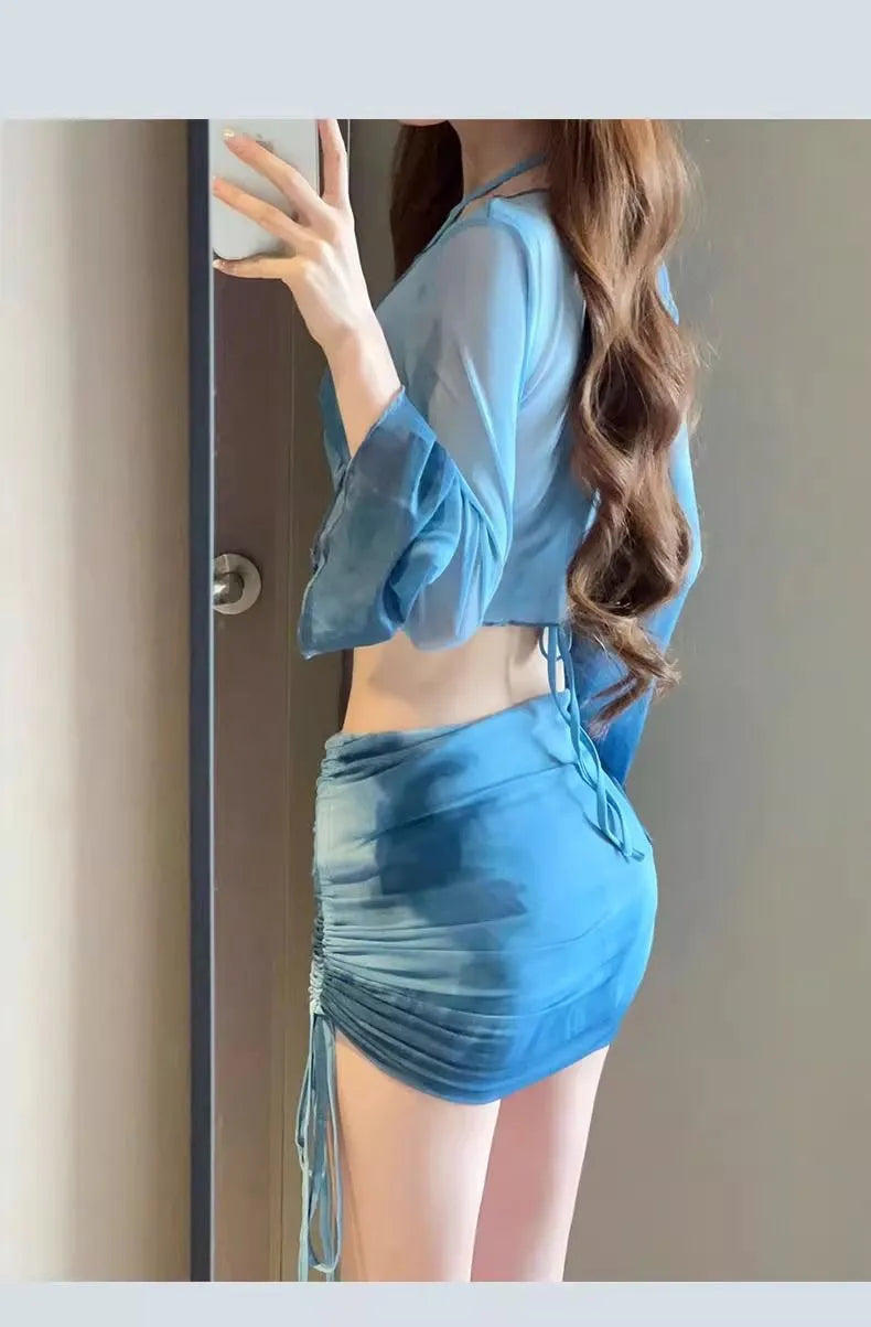 Women's blue high-waisted bikini four-piece set with shirt, bra, underwear and skirt for swimming