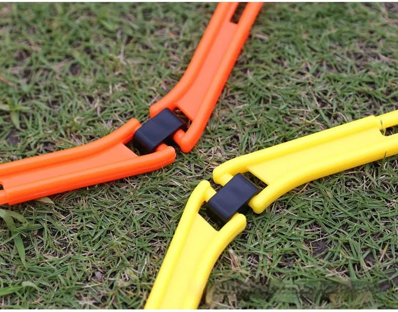 Six foldable hexagonal agility training rings in bright colours for football and basketball drills