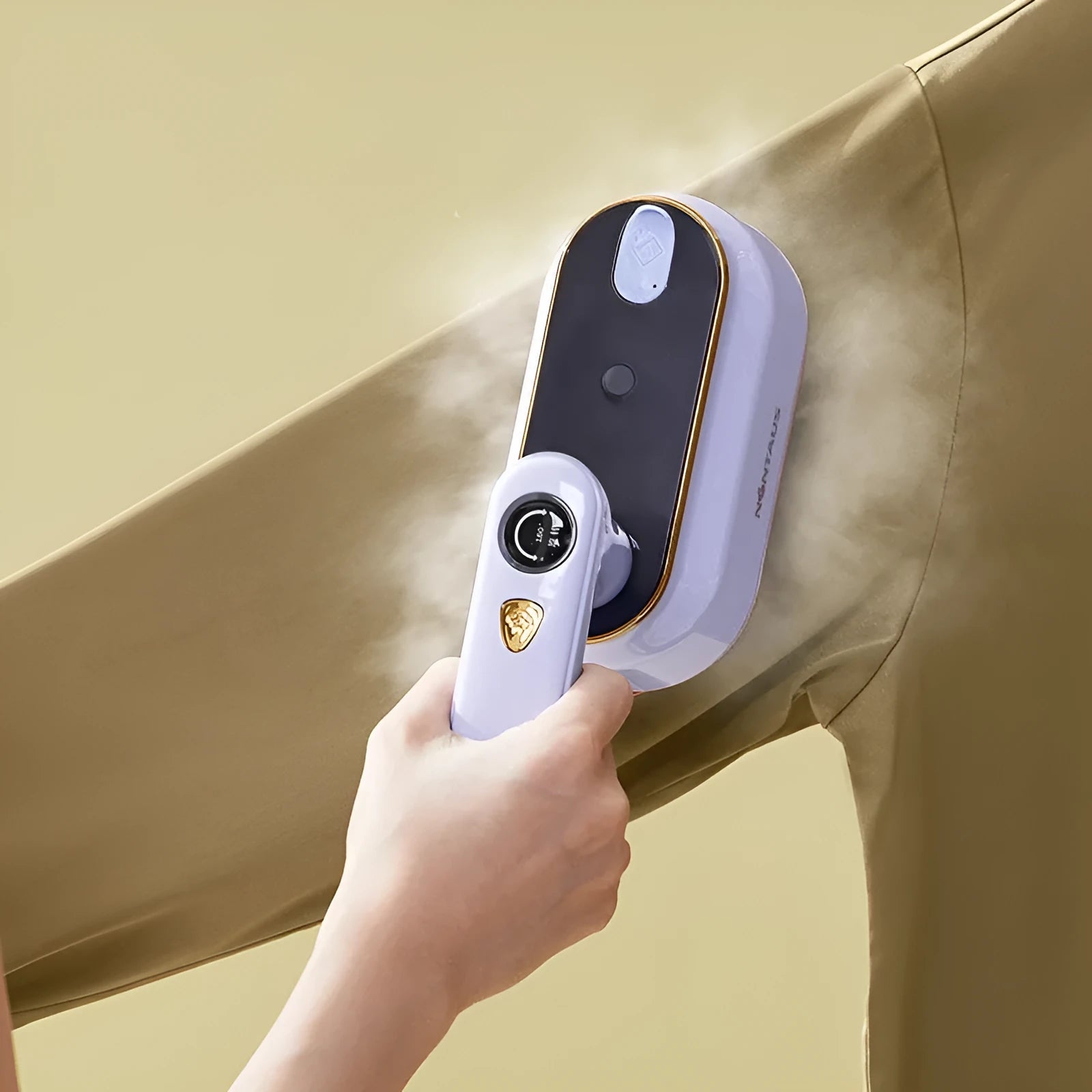 Foldable light purple travel steam iron with ceramic soleplate and international plug adapters.