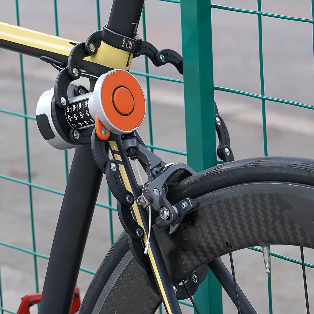 Black folding bicycle lock showing compact folded design with multi-material construction