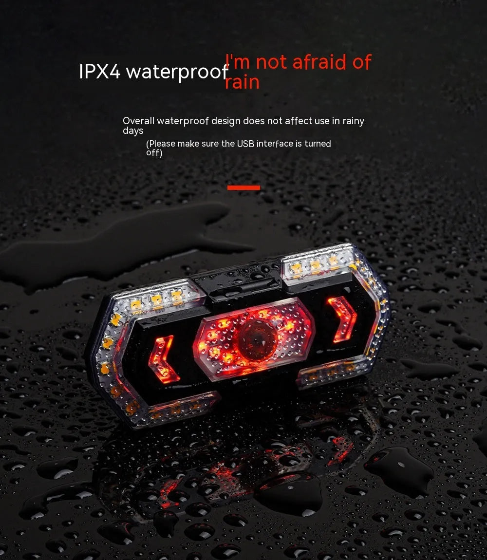 Black wireless remote control vehicle taillight with turn signal indicators and USB charging port