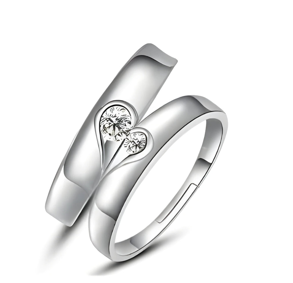 Heart-shaped diamond ring on finger, copper electroplate finish, couples wedding engagement style