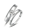 Heart-shaped diamond ring on finger, copper electroplate finish, couples wedding engagement style