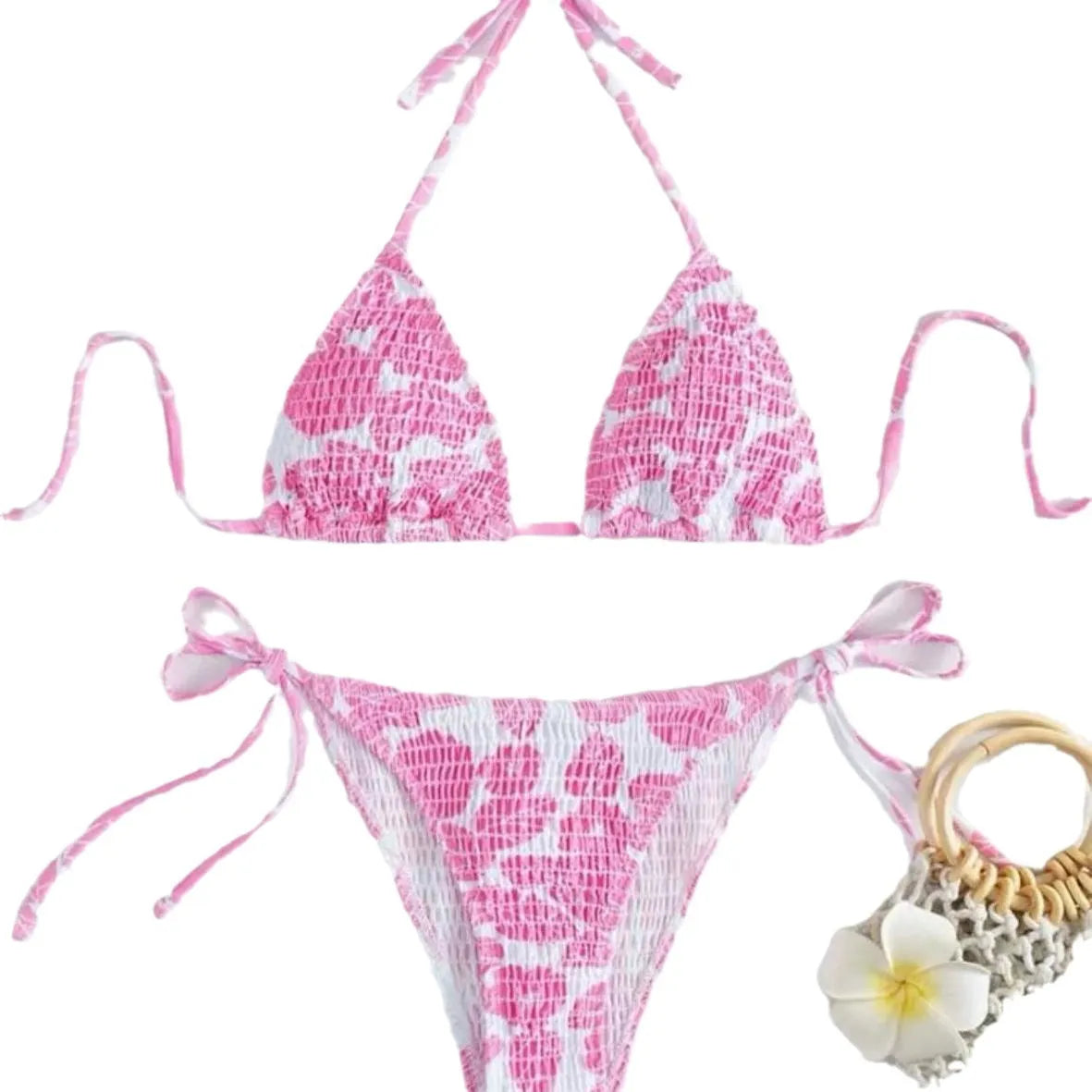 Women's floral halter neck two-piece swimsuit in light blue on a mannequin.