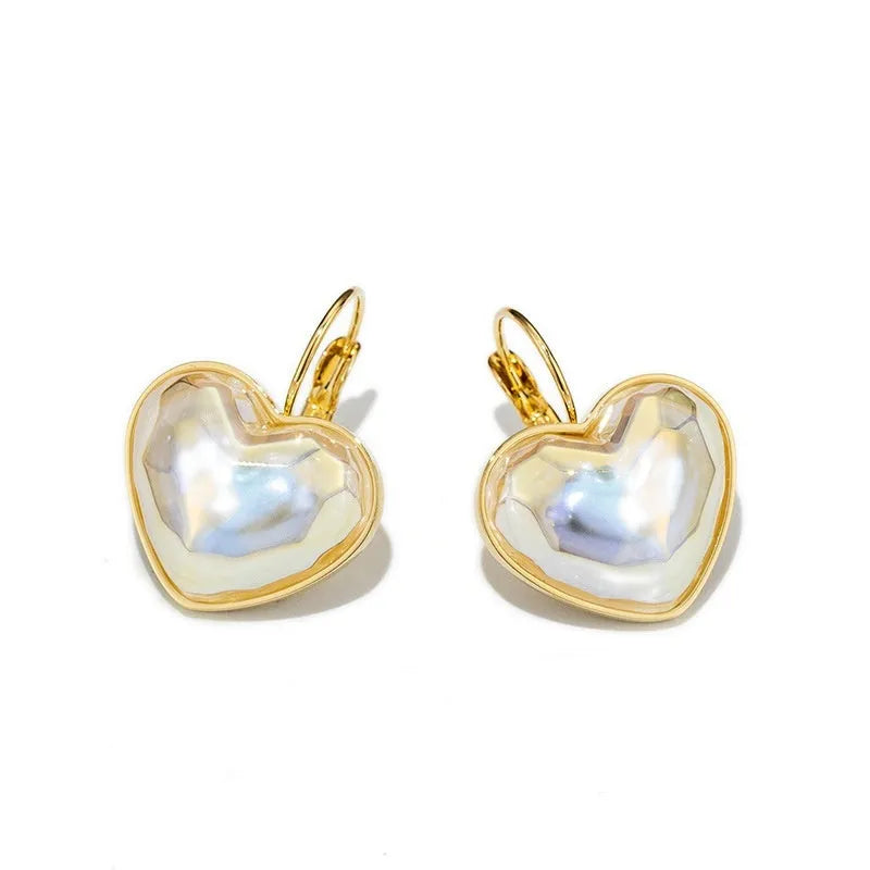 Gold colour clip-on earrings for women with metal alloy construction and natural summer style design