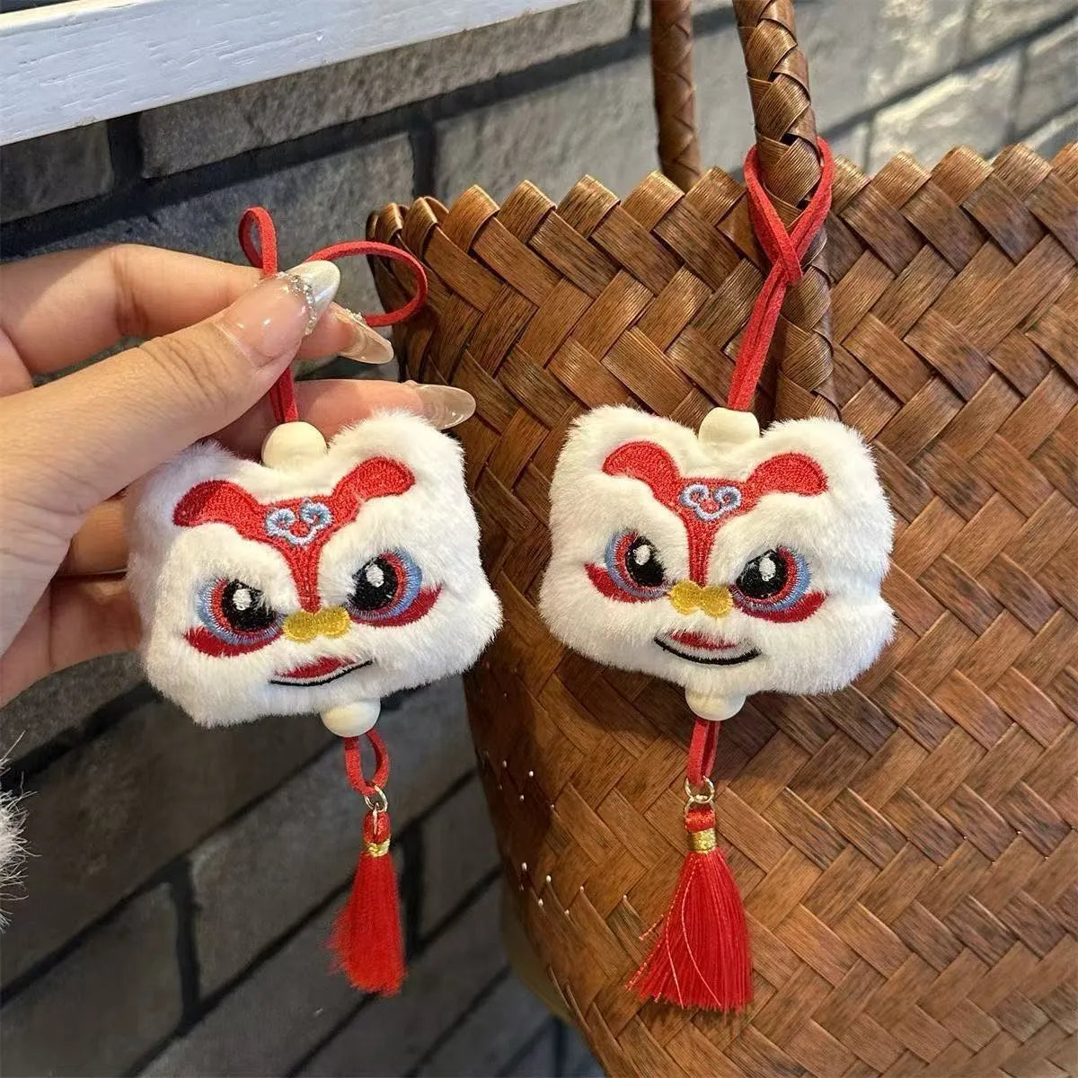 Blue handmade plush lion tassel keychain ornament with star stone detail