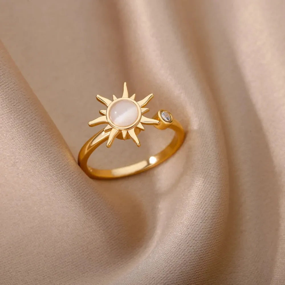 Gold and platinum rotatable decompression ring with adjustable opening and geometric round design