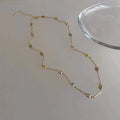 Square geometric clavicle chain necklace with crystal accents in gold plating