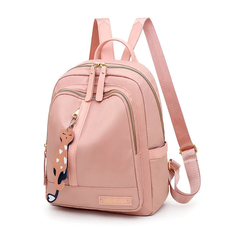 Black or pink casual nylon backpack with waterproof features and organised internal compartments
