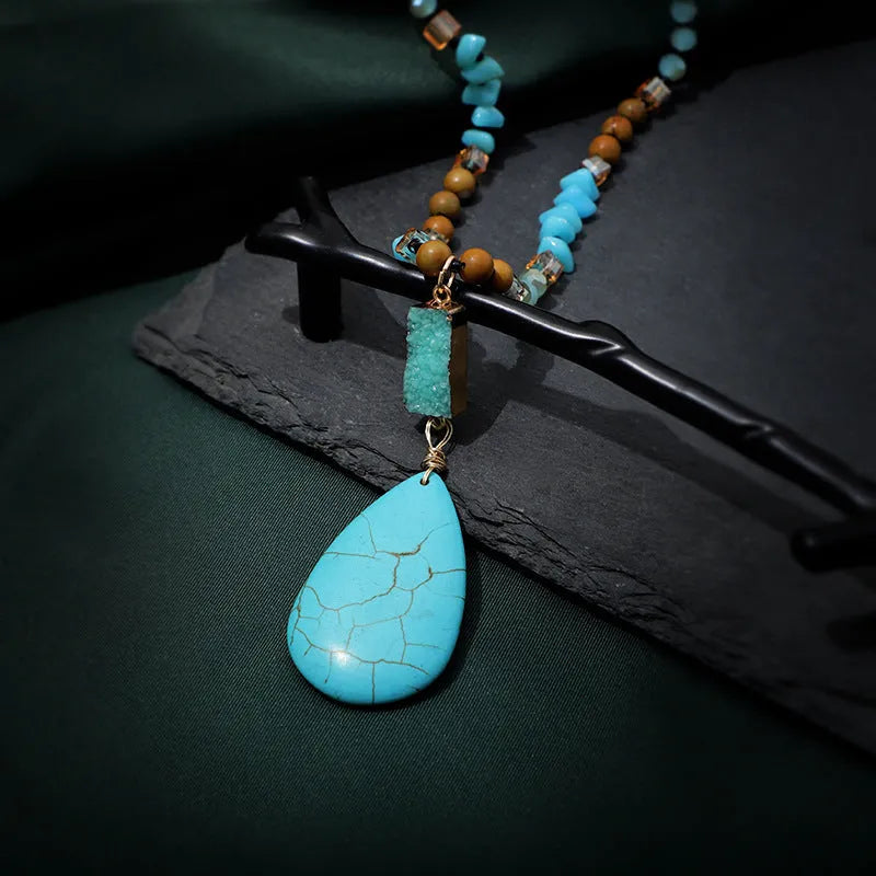 Turquoise blue imitation mineral pendant necklace with mixed gem inlaid details on ball bead chain