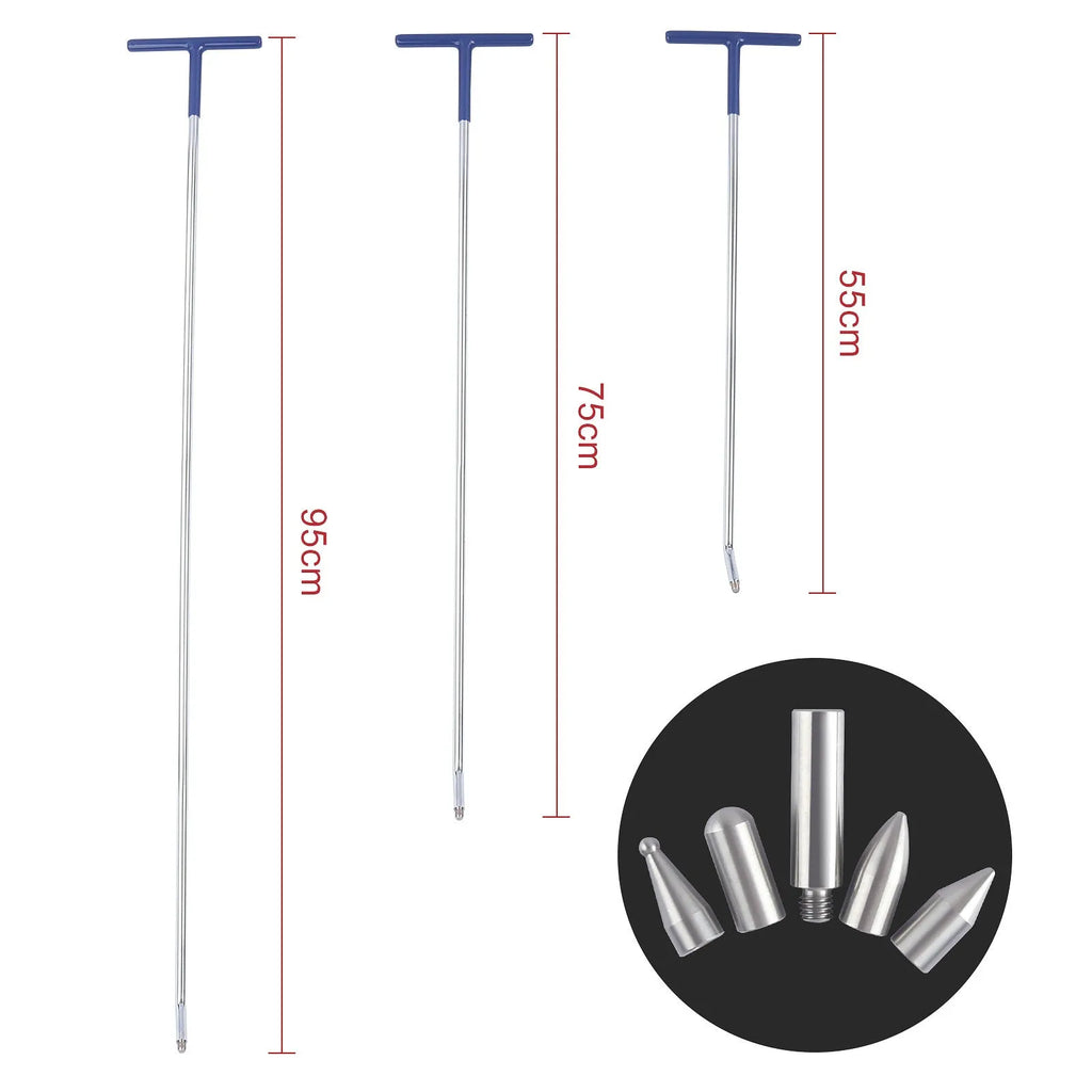 Three alloy steel car dent repair crowbars of different sizes on a workshop surface