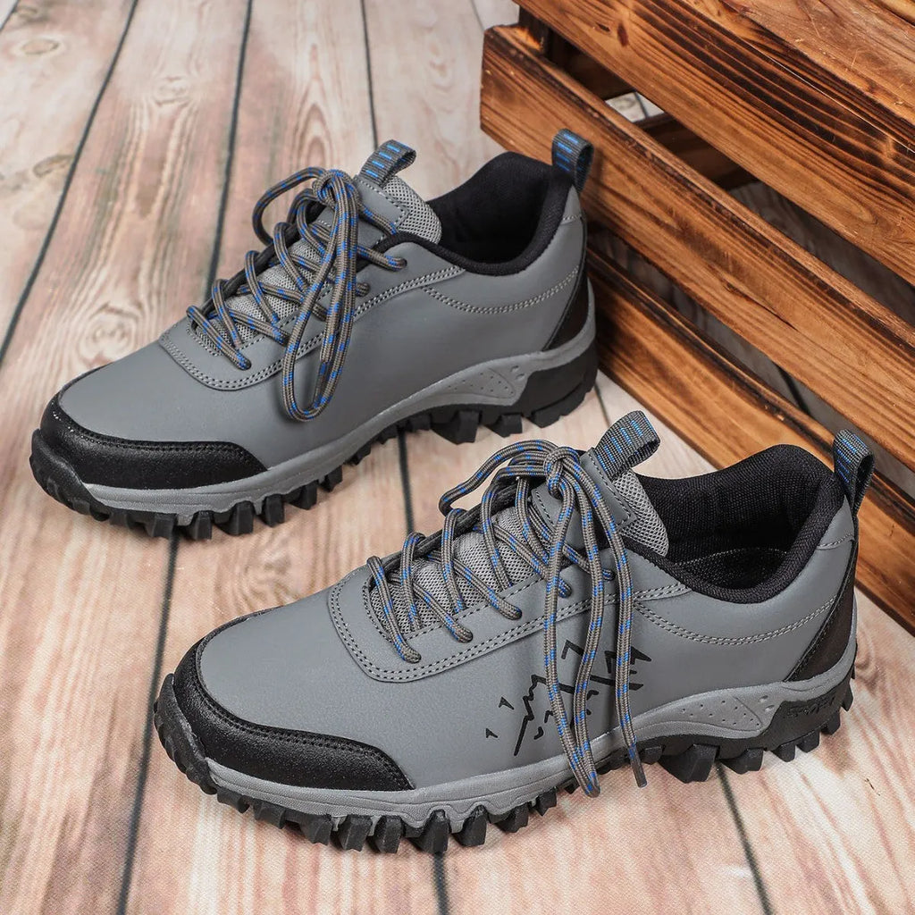 Wear-resistant low-top outdoor sneakers in dark gray with mesh lining and TPR sole, side view