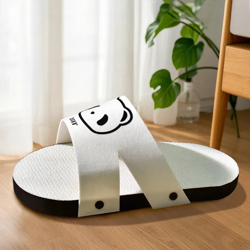 White corrugated paper cat scratch board in slipper style design for feline scratching