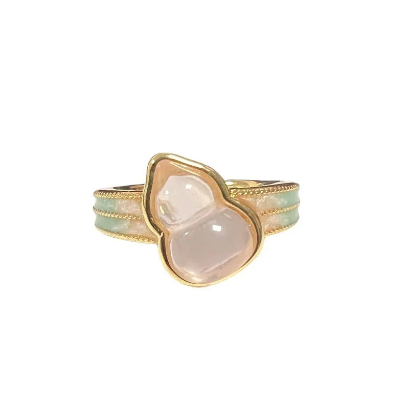 Adjustable vintage-style copper ring with a gourd shape, floral design, and zircon stones.