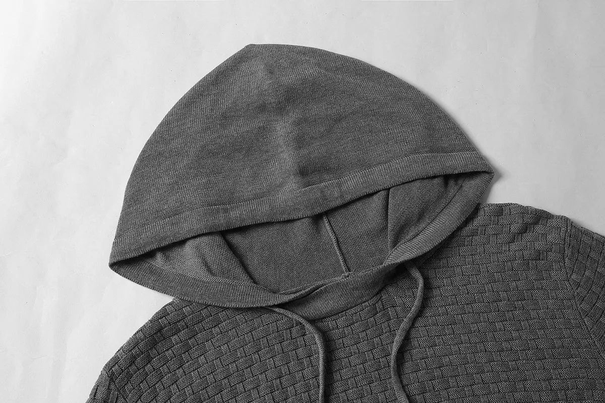 Men's black cotton-polyester blend hooded sweatshirt on a hanger