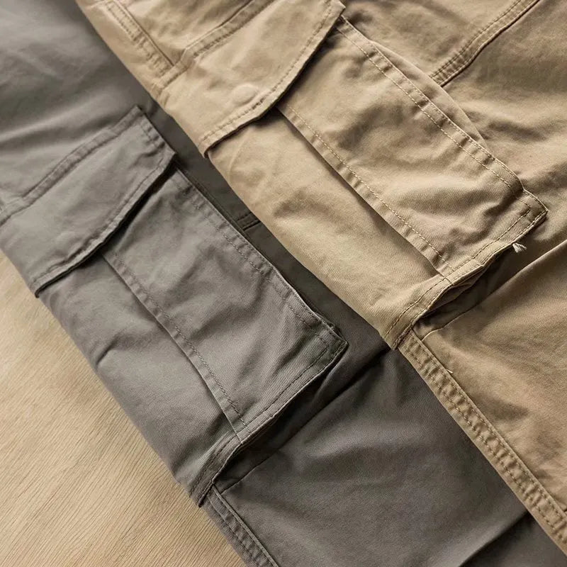 Men's cotton multi-pocket labour trousers in cropped length shown in khaki colour