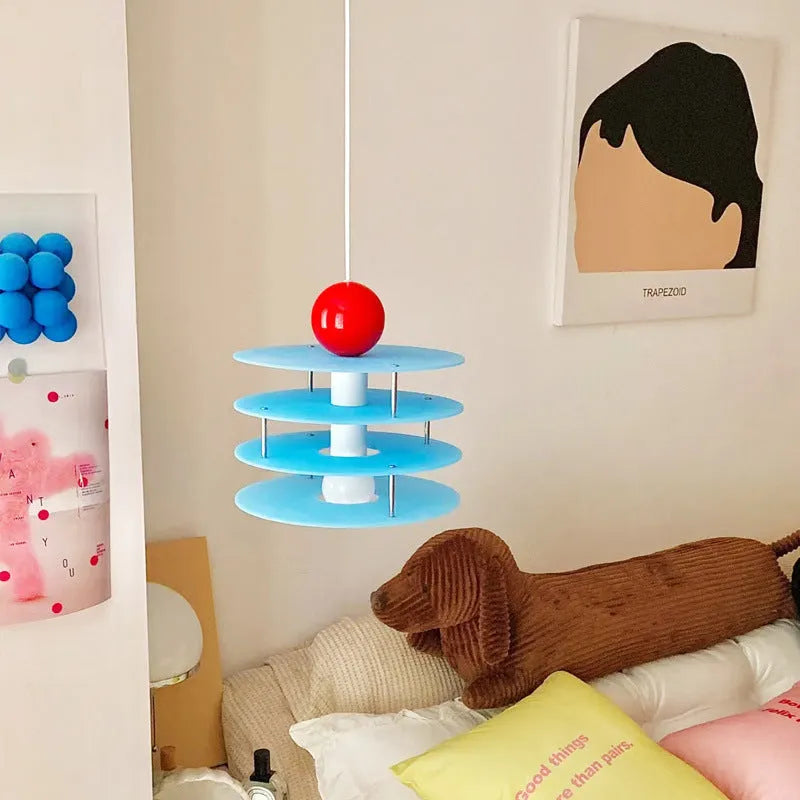 Modern Macaron PH5 adjustable chandelier with frosted glass shade in choice of white, blue, or orange.