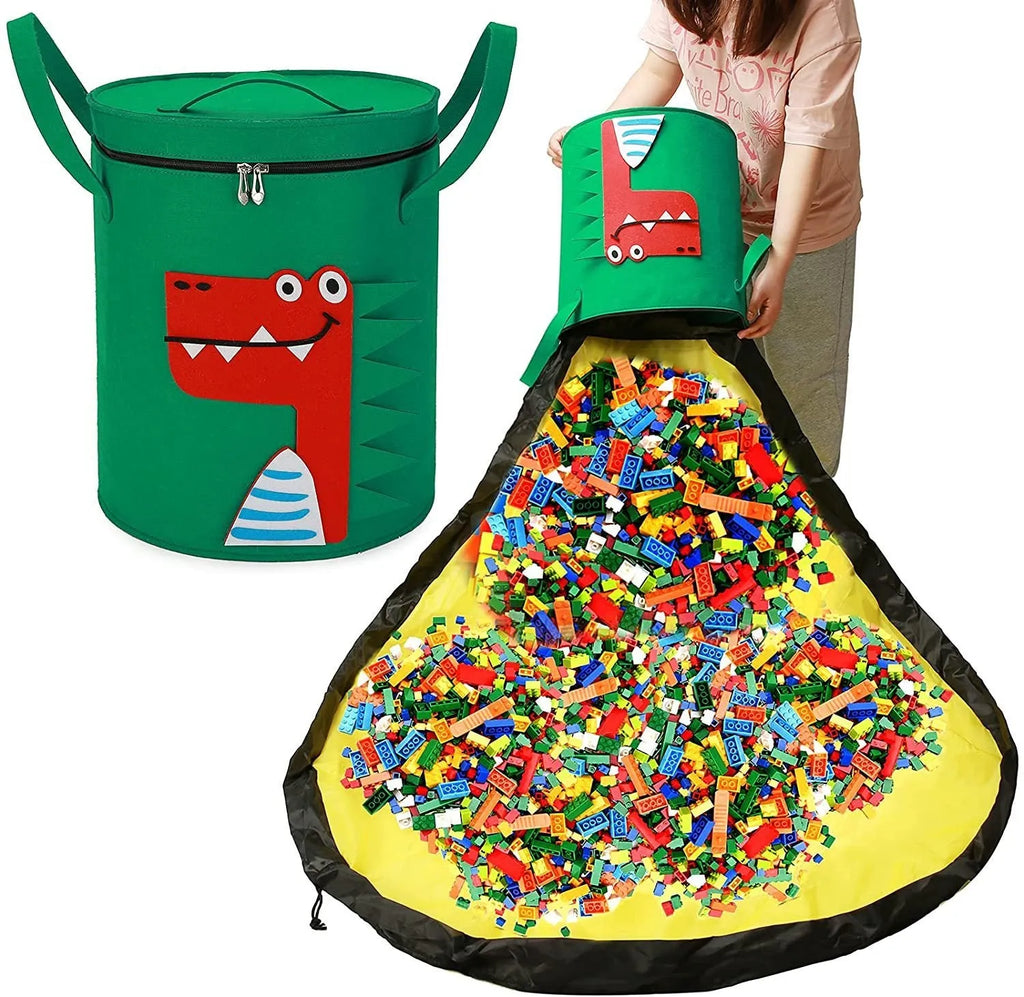 Green felt cube storage bag with pull rope closure lying flat as a play mat.