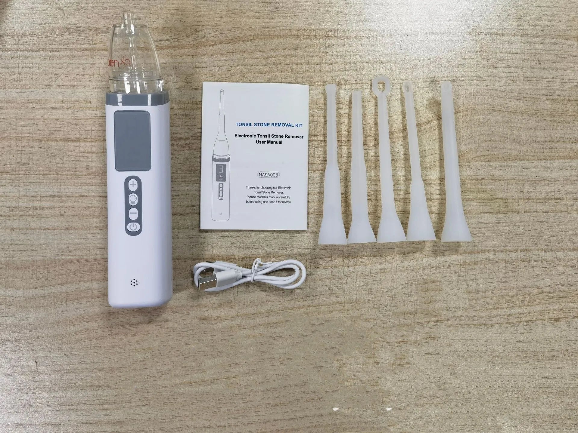 Milky white tonsil stone extractor oral cleaning tool for dental stone removal