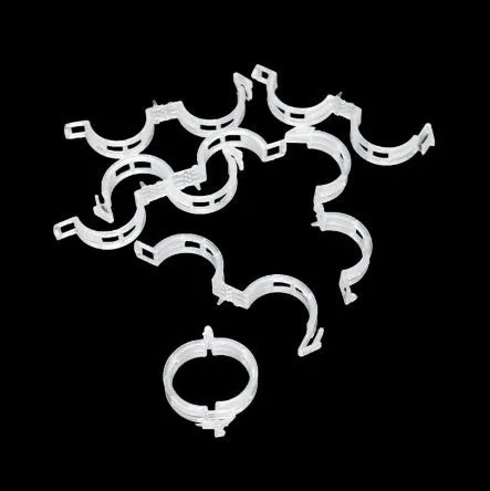 Pack of 50 plastic plant grafting clips for supporting tomato flowers and garden vines.