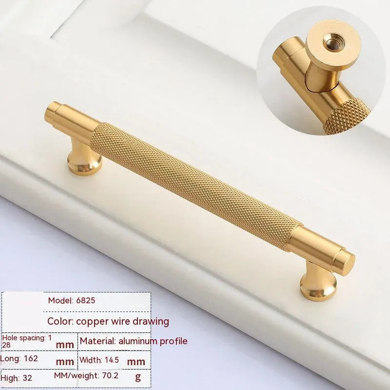 Brushed brass aluminium wardrobe handle in modern European style on a white background.