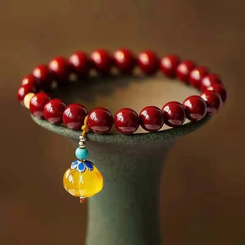 Handmade wave-shaped cinnabar and copper bead bracelet in national style.