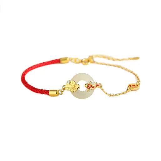 Women's 925 silver bracelet with gold electroplated peace buckle, koi fish charm, and adjustable red rope.