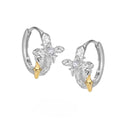 925 sterling silver cross earrings with white gold colour finish and geometric round element design.