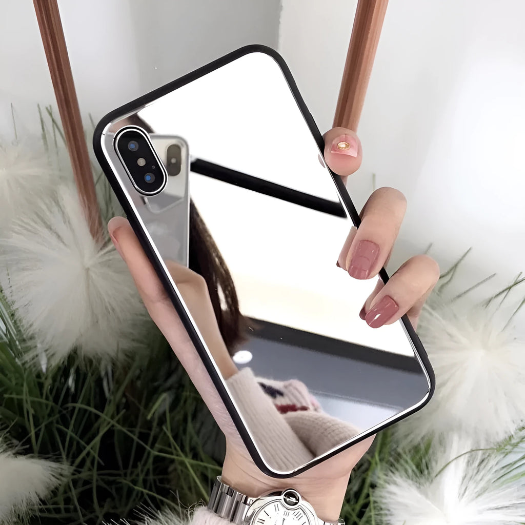 Black iPhone mirror phone case showing reflective surface on back, compatible with iPhone X and other models.