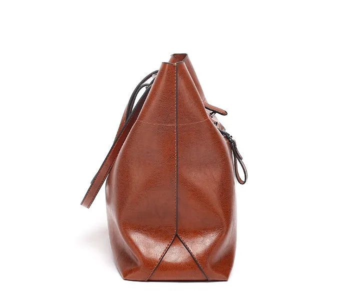 Wax cowhide leather handbag with cross-section design showing internal mobile phone pouch
