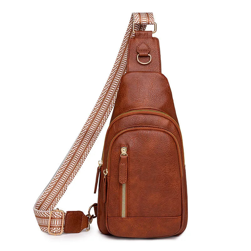 Women's soft brown PU chest bag with crossbody strap and open front pocket.
