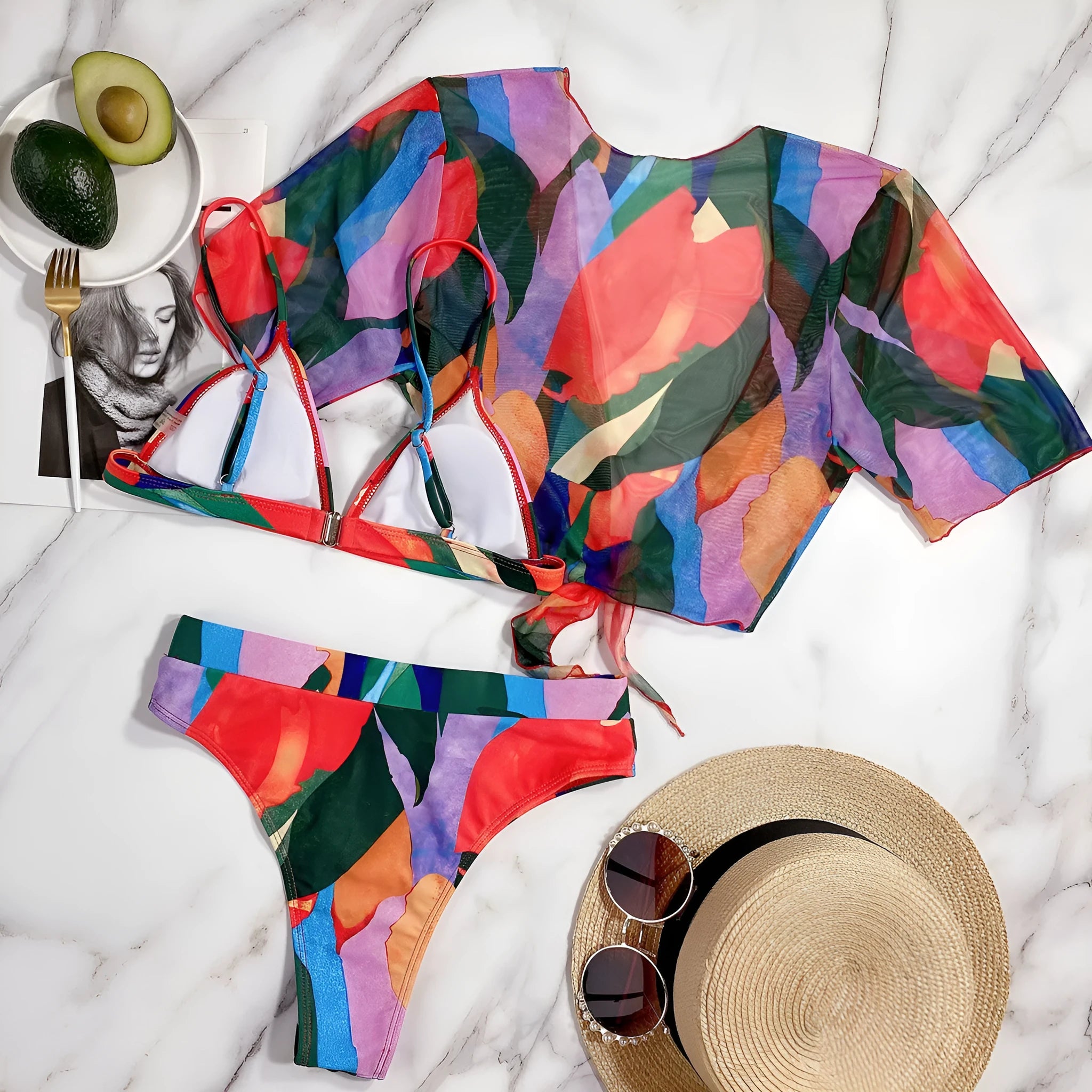 Red women's printed split design swimsuit or bikini made from nylon fabric.
