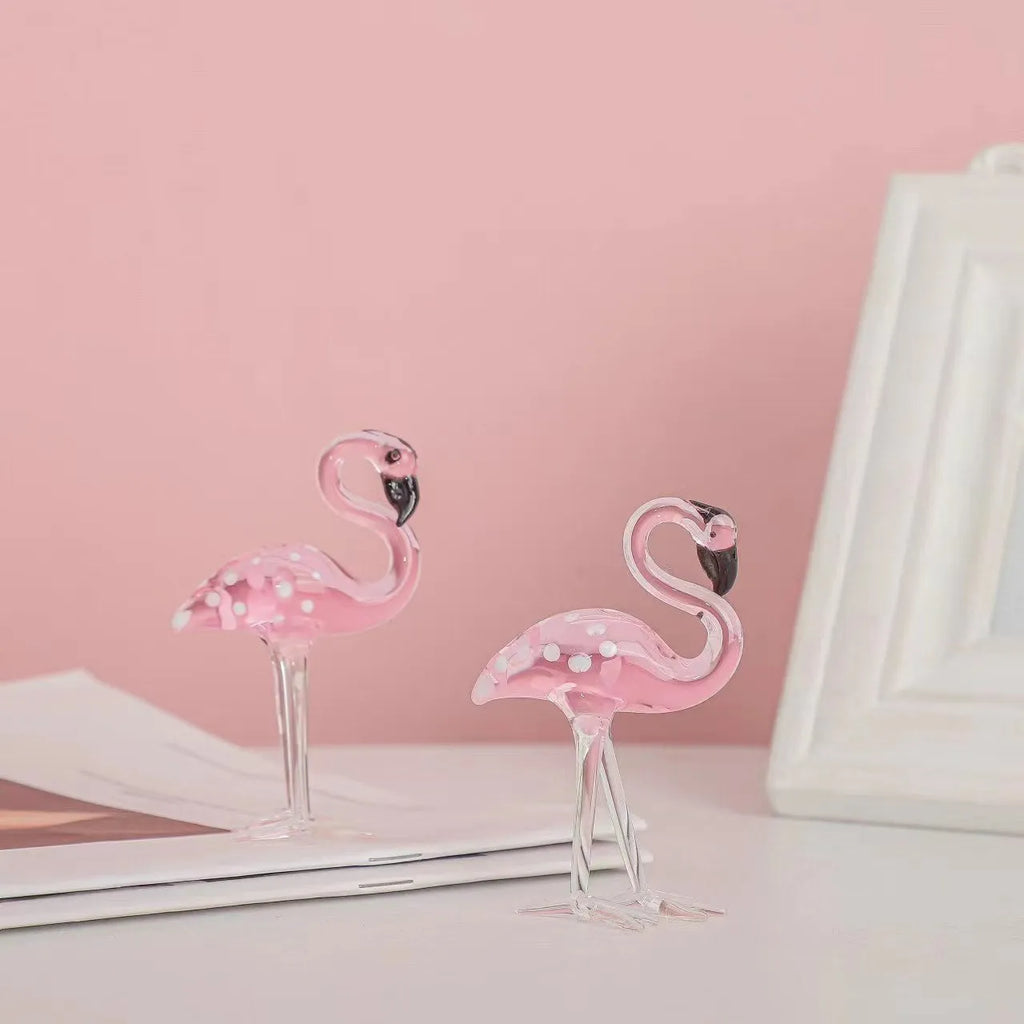 Pink crystal flamingo decorative animal figure on table with modern minimalist style