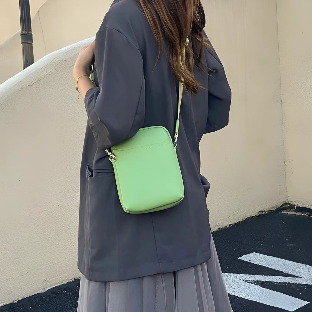 Solid colour small crossbody shoulder bag for women in beige, black, green, or khaki