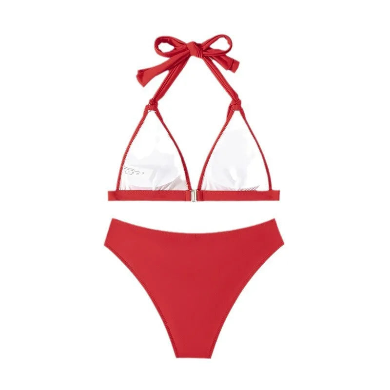 Red women's halterneck bikini with lace-up front closure and adjustable tie sides