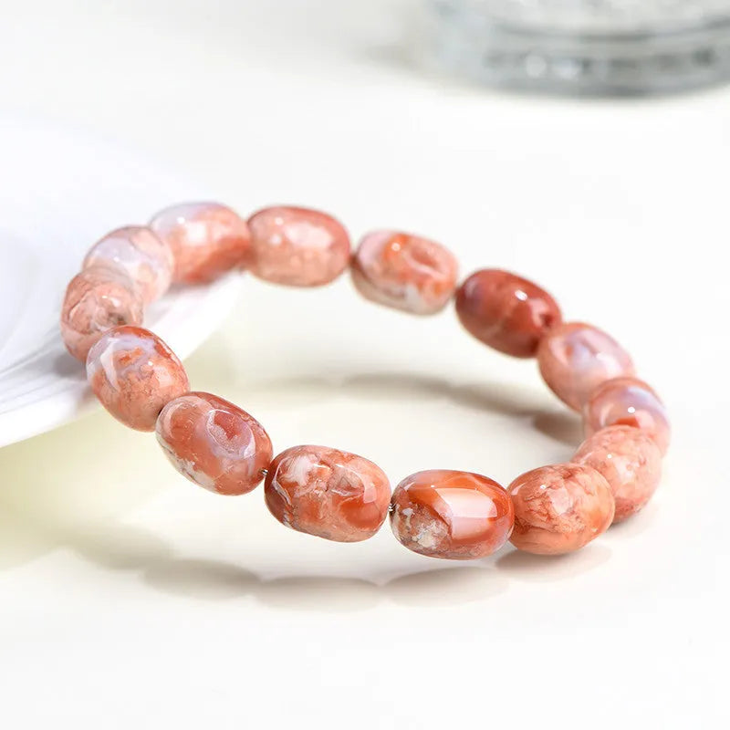 Natural cherry agate barrel bead bracelet with geometric beads and Ruyi charm