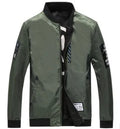Men's reversible flight jacket in stripe pattern showing black, blue and green colour options