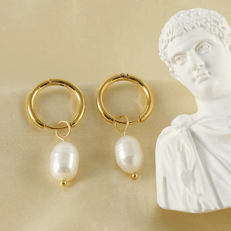 Geometric pearl earrings with gold electroplating on stainless steel and titanium steel construction