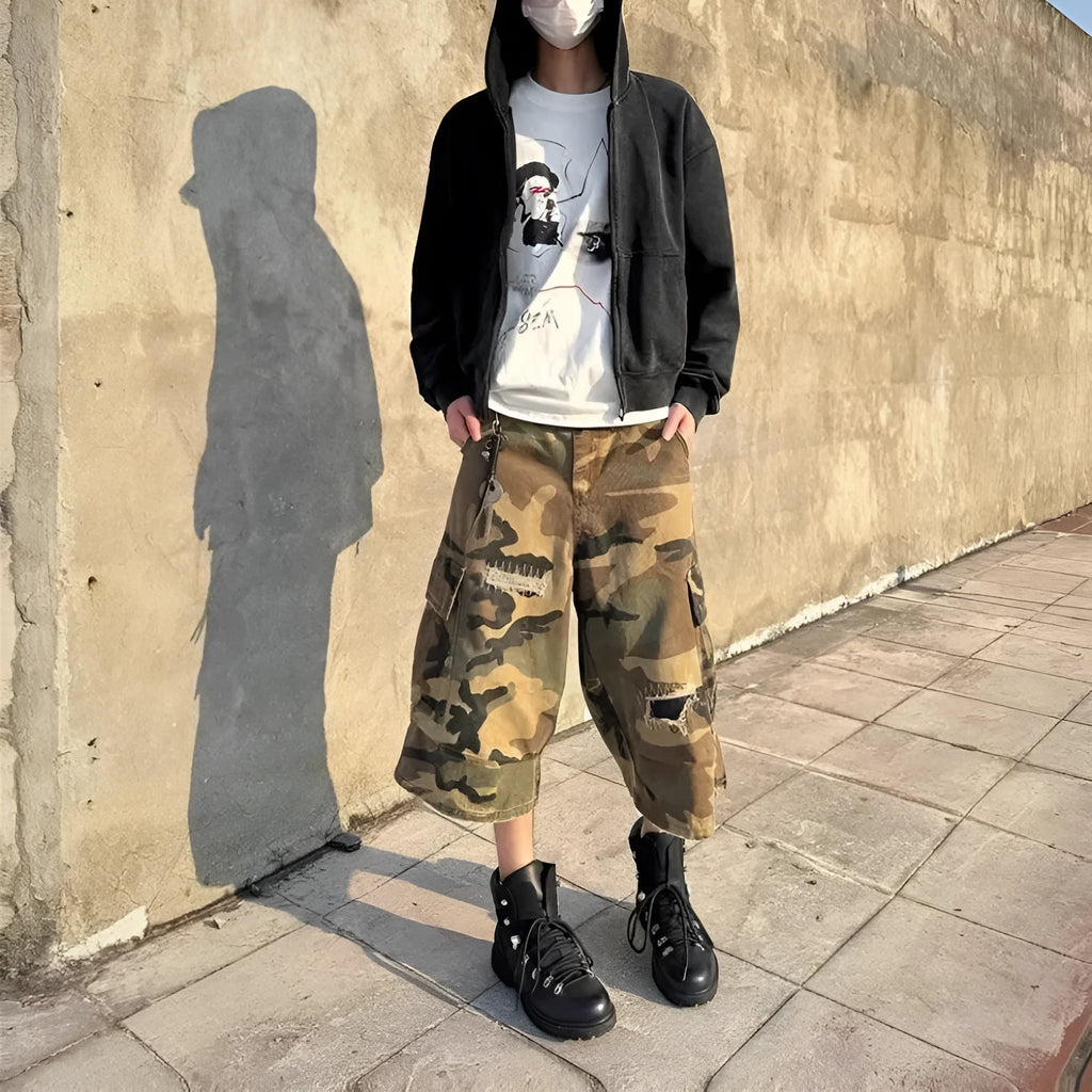 Men's camouflage cropped jeans with retro patches and ripped detailing on straight leg trousers