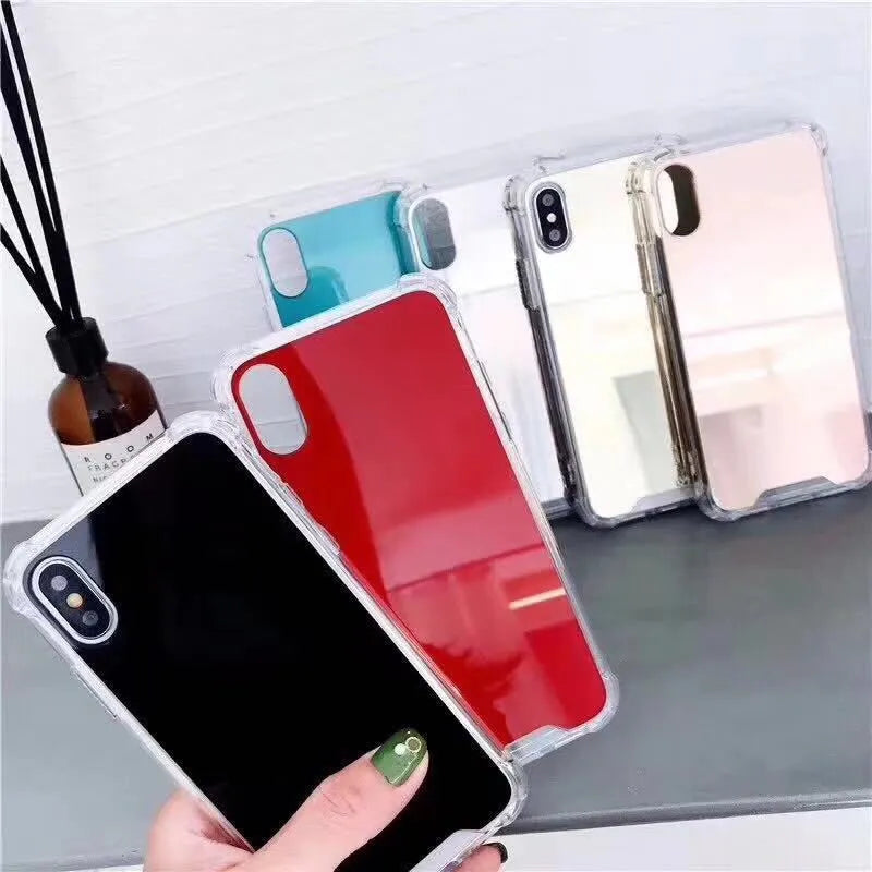 Mirror iPhone Case in various colours including black, blue, gold, rose gold, silver, and transparent.